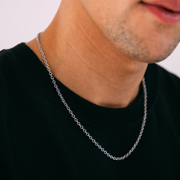 Model wearing mens 3mm silver cable chain necklace