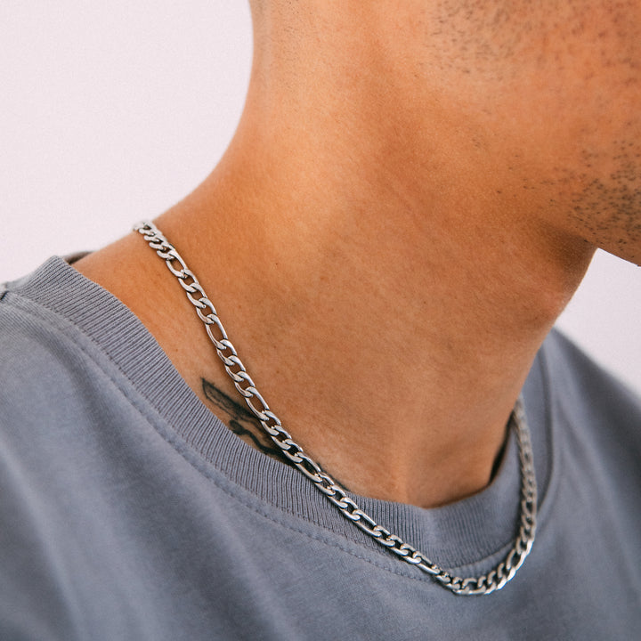 Model wearing mens 5mm silver figaro chain necklace