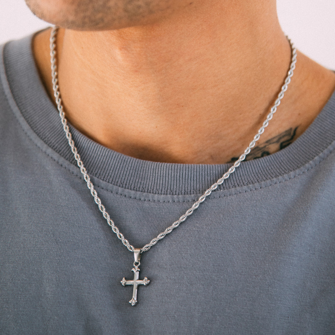 Model wearing mens cross pendant necklace